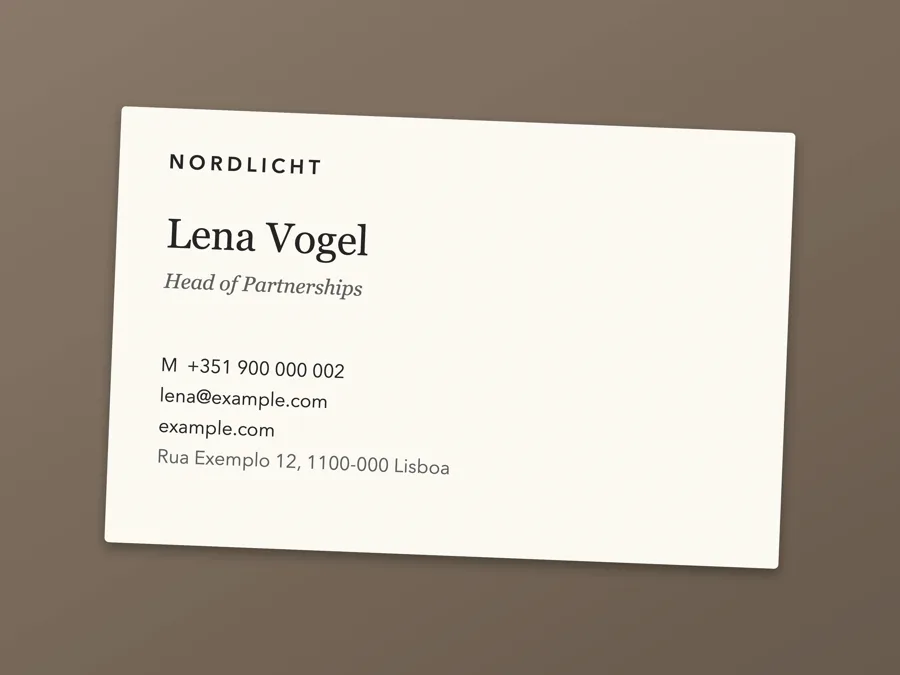 A paper business card on a table: Lena Vogel, Head of Partnerships, Nordlicht.